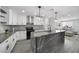 Bright, open kitchen with quartz countertops, stainless appliances, and seamless flow into the living area at 3905 Casa Grande Ave, Las Vegas, NV 89102