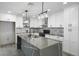 Updated kitchen with a large island, modern finishes, and plenty of storage space at 3905 Casa Grande Ave, Las Vegas, NV 89102
