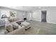 Spacious living room with neutral decor, modern fireplace, and natural light, perfect for relaxing at 3905 Casa Grande Ave, Las Vegas, NV 89102