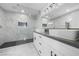 Modern main bathroom featuring a double vanity and walk-in shower at 3905 Casa Grande Ave, Las Vegas, NV 89102