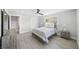 This light-filled main bedroom features hard surface floors and neutral walls at 3905 Casa Grande Ave, Las Vegas, NV 89102