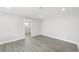 This room has neutral walls, wood-look floors, and recessed lighting at 3905 Casa Grande Ave, Las Vegas, NV 89102