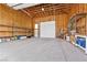 Large garage with high ceilings and shelving providing ample storage space at 4185 W Arby Ave, Las Vegas, NV 89118