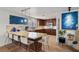 Bright kitchen featuring tile floors, custom cabinets, granite countertops and stainless steel appliances at 4185 W Arby Ave, Las Vegas, NV 89118