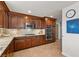 The updated kitchen boasts granite counters, stainless appliances, and ample cabinet space at 4185 W Arby Ave, Las Vegas, NV 89118