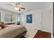 Well-lit main bedroom with hardwood floors, comfortable seating, and bright interior at 4185 W Arby Ave, Las Vegas, NV 89118
