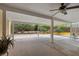 Covered patio with ceiling fan and views of the landscaping in the backyard at 4185 W Arby Ave, Las Vegas, NV 89118