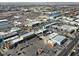 Aerial view of neighborhood with industrial buildings, roads, and landscaping at 4381 W Flamingo Rd # 3109, Las Vegas, NV 89103