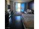Bright bedroom with floor-to-ceiling windows showcasing city views and a comfortable king-size bed at 4381 W Flamingo Rd # 3109, Las Vegas, NV 89103