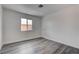 Bright bedroom with a window and neutral color palette at 4432 Ash Ave, Las Vegas, NV 89110