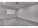 Clean bedroom featuring updated flooring, fresh paint, and lots of natural light at 4432 Ash Ave, Las Vegas, NV 89110