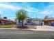 Charming single-story home with a well-maintained yard and a driveway leading to an attached garage at 4432 Ash Ave, Las Vegas, NV 89110