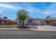 Charming single-story home with a well-kept front yard, fenced lawn, and a mature tree at 4432 Ash Ave, Las Vegas, NV 89110