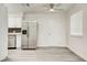Open kitchen area boasts stainless steel appliances, and natural light at 4432 Ash Ave, Las Vegas, NV 89110