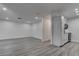 Open floor plan with modern kitchen, and spacious living area at 4432 Ash Ave, Las Vegas, NV 89110