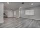 Spacious living area with updated flooring, neutral colors, and plenty of natural light at 4432 Ash Ave, Las Vegas, NV 89110