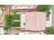 Aerial view of a backyard featuring artificial turf, landscaping, patio, and outdoor seating, creating a private oasis at 4909 Cherokee Run Ct, Las Vegas, NV 89131