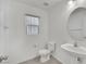 Clean bathroom with a modern sink and toilet at 4909 Cherokee Run Ct, Las Vegas, NV 89131