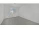 Neutral carpeted bedroom with window at 4909 Cherokee Run Ct, Las Vegas, NV 89131