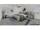 Bright bedroom with neutral decor, ample natural light, and a ceiling fan at 4909 Cherokee Run Ct, Las Vegas, NV 89131