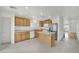 Bright kitchen with stainless steel appliances, island, and ample counter space at 4909 Cherokee Run Ct, Las Vegas, NV 89131