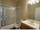 Standard bathroom featuring a tub and a sliding shower door at 4941 Black Bear Rd # 202, Las Vegas, NV 89149