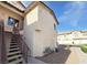 Inviting condominium exterior with stairs leading to the upper level at 4941 Black Bear Rd # 202, Las Vegas, NV 89149