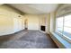 Cozy living room featuring a fireplace and ample natural light at 4941 Black Bear Rd # 202, Las Vegas, NV 89149