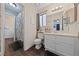 Bathroom featuring modern fixtures, neutral tones, and a shower-tub combo at 504 Crony Ave, Henderson, NV 89011