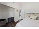 This is a neutral bedroom with a closet and wardrobe and an attached bath area at 504 Crony Ave, Henderson, NV 89011