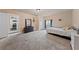 Expansive primary bedroom showcases neutral walls and adjoins the kitchen at 504 Crony Ave, Henderson, NV 89011
