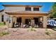 Spacious back porch with ample room for seating and overlooking the backyard at 5412 Rainbows End Dr, Las Vegas, NV 89149