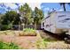 Backyard view featuring a garden bed and space for a recreational vehicle at 5412 Rainbows End Dr, Las Vegas, NV 89149