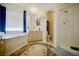 Bathroom with bathtub, shower, and separate toilet at 5412 Rainbows End Dr, Las Vegas, NV 89149