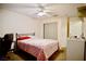 This bedroom is lit by a ceiling fan and features carpet flooring and natural light at 5412 Rainbows End Dr, Las Vegas, NV 89149