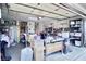 Garage with plenty of natural light featuring ample space, storage units, and a workbench, perfect for DIY enthusiasts at 5412 Rainbows End Dr, Las Vegas, NV 89149