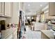 Bright kitchen boasts tile floors, countertops, and ample cabinet space at 5412 Rainbows End Dr, Las Vegas, NV 89149