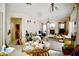 Bright living room and fireplace view from the breakfast nook at 5412 Rainbows End Dr, Las Vegas, NV 89149