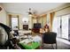 Spacious living room featuring a fireplace and sliding glass door at 5412 Rainbows End Dr, Las Vegas, NV 89149