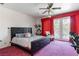 Comfortable bedroom with large bed, and view to the outside at 56 Quail Run Rd, Henderson, NV 89014