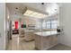Bright kitchen featuring stainless steel appliances, gas cooktop, and light wood cabinetry at 56 Quail Run Rd, Henderson, NV 89014