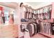 Spacious walk-in closet with custom shelving and ample storage space at 56 Quail Run Rd, Henderson, NV 89014