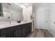 Bathroom with a double vanity, framed mirrors, and modern fixtures at 6141 May River St, Las Vegas, NV 89148