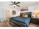 Bedroom featuring a comfortable bed, nightstands, and a bright window for natural light at 6141 May River St, Las Vegas, NV 89148