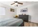 Inviting bedroom with soft light, wood-look floors, and decor creates a cozy and relaxing personal space at 6141 May River St, Las Vegas, NV 89148