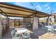 Community outdoor kitchen featuring a covered dining area, grilling stations, and ample seating at 6141 May River St, Las Vegas, NV 89148