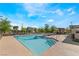 Resort-style community pool with lounge chairs and covered cabanas perfect for relaxation at 6141 May River St, Las Vegas, NV 89148