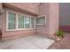 Backyard featuring gravel, small rock features and a concrete patio at 6599 Netherseal Ave, Las Vegas, NV 89139