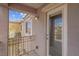 Balcony featuring stone pillars and outdoor lighting fixture at 6599 Netherseal Ave, Las Vegas, NV 89139