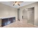 Bedroom featuring ceiling fan, closet and light laminate flooring at 6599 Netherseal Ave, Las Vegas, NV 89139